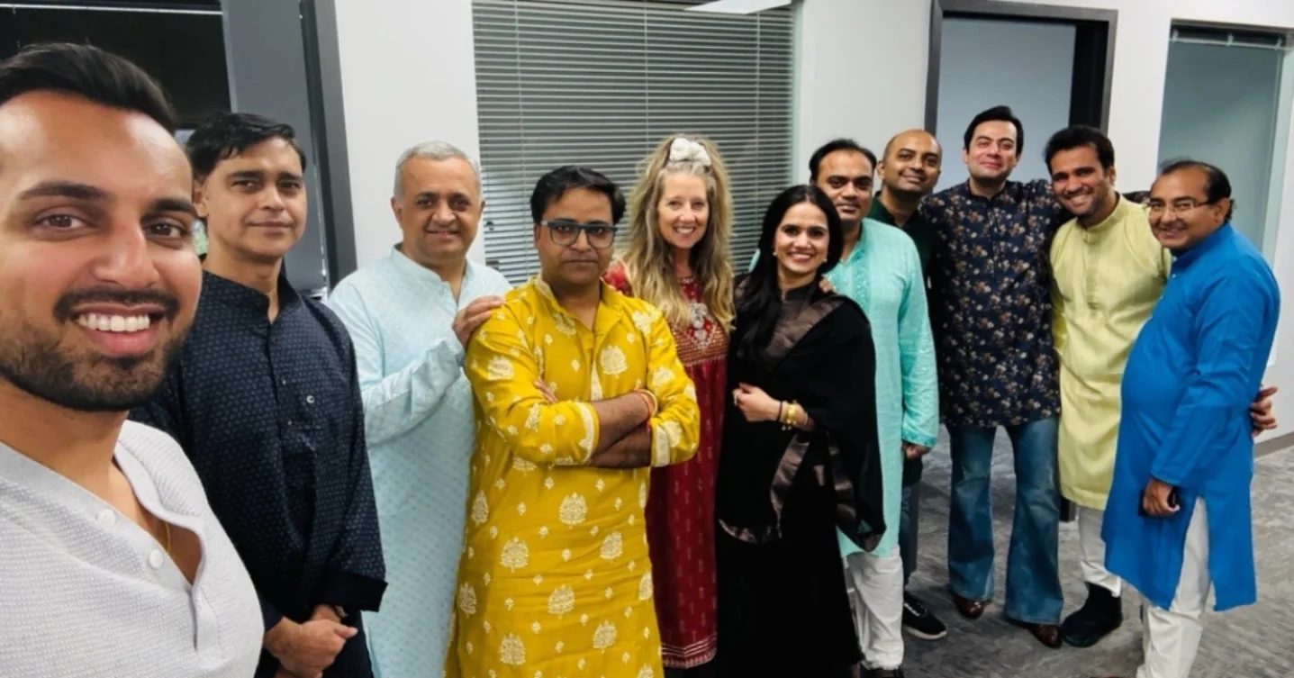 Damco's US team in kurtas and sarees celebrating Diwali
