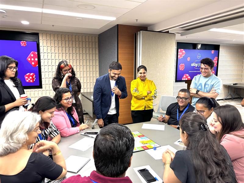 Colleagues gathered around a table during a workshop