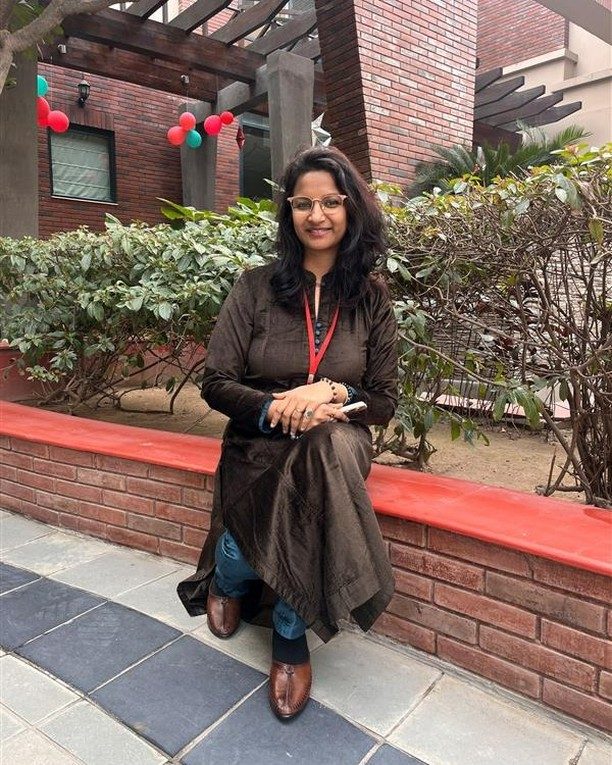 Arnica Singhal sitting in a garden