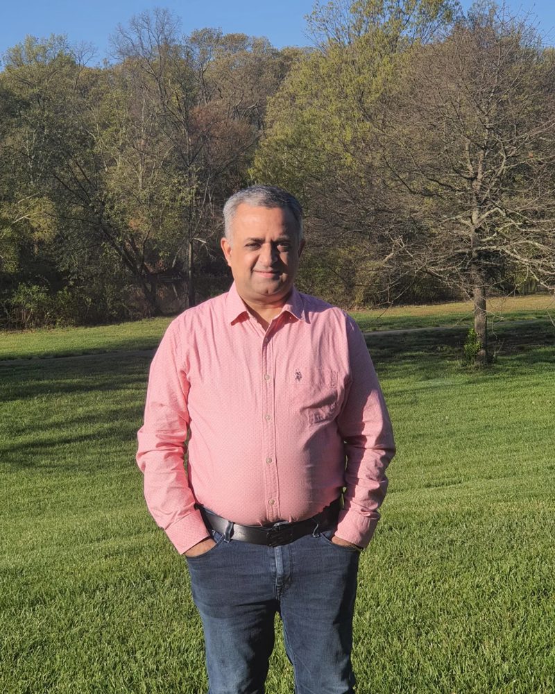 Madhur Anand on a lawn