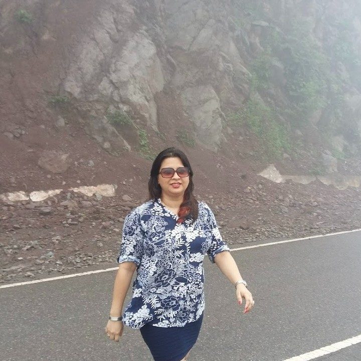 Neelam Bhatt walking on a mountain road